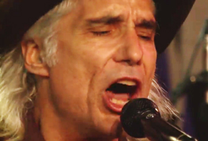 Teary eyed Coyote sings